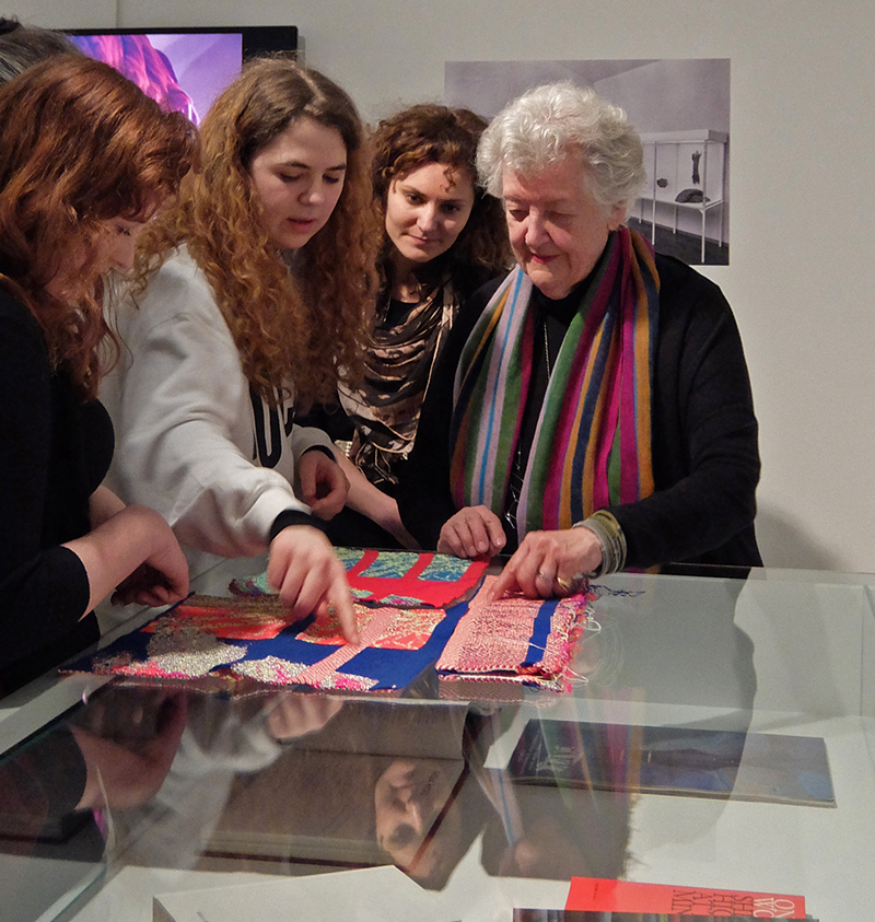 Sheila Hicks with students at her exhibition "Why Not"